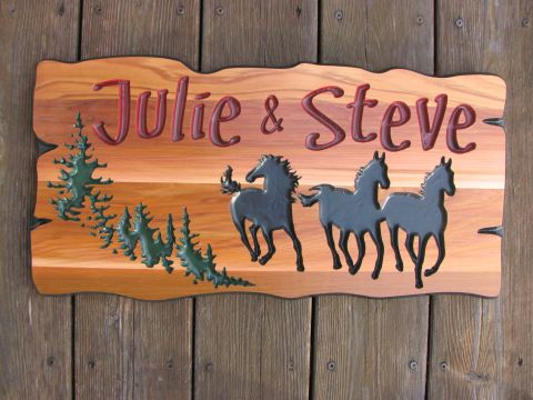 Ranch style wooden sign with horses
